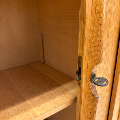 Mid-Century oak sideboard with sliding doors