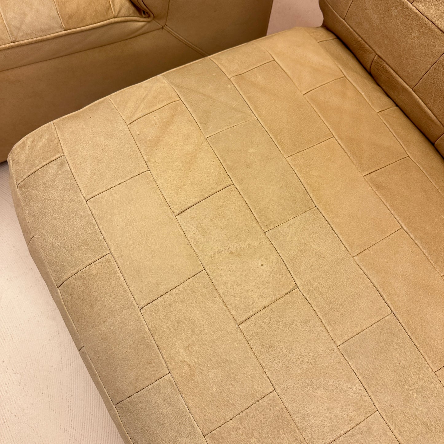 Modular beige leather patchwork sofa