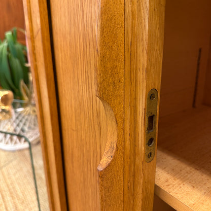 Mid-Century oak sideboard with sliding doors
