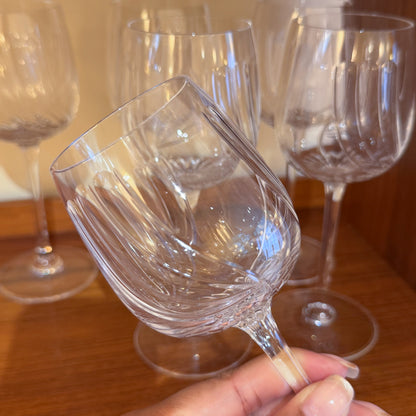 Twisted optic crystal glasses