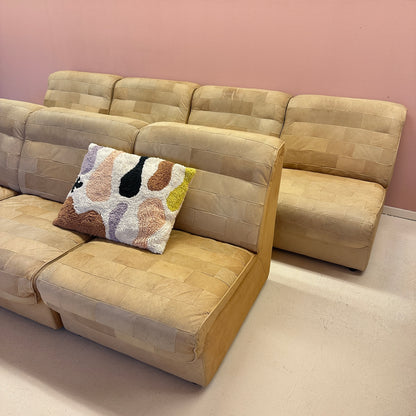 Modular beige leather patchwork sofa