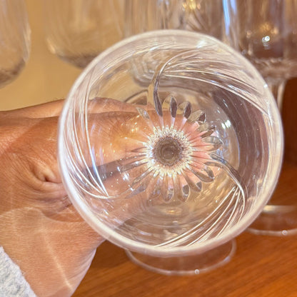 Twisted optic crystal glasses