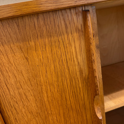 Mid-Century oak sideboard with sliding doors