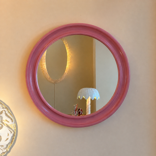 A pink 1970’s round upcycled mirror by Carrara & Matta, Italy