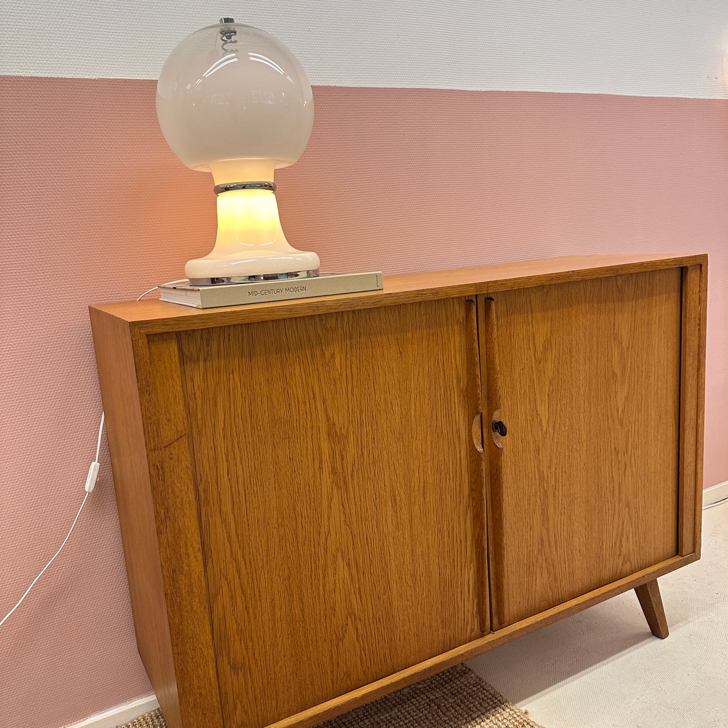 Mid-Century oak sideboard with sliding doors