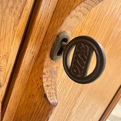 Mid-Century oak sideboard with sliding doors