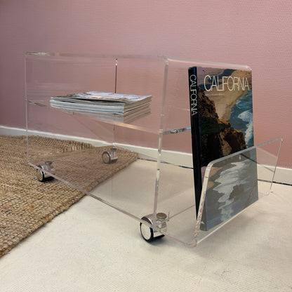 Lucite sidetable with magazineholder on wheels