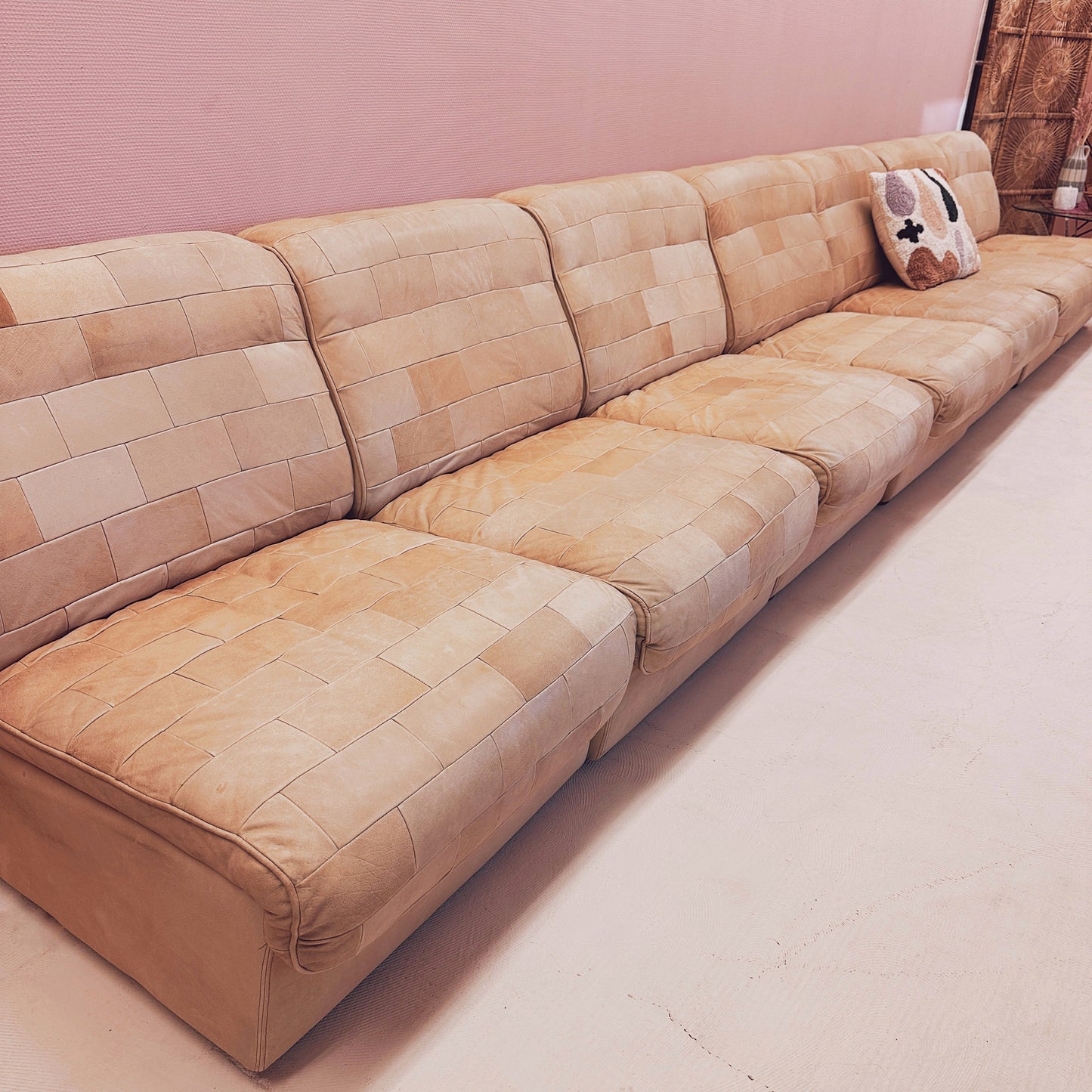 Modular beige leather patchwork sofa