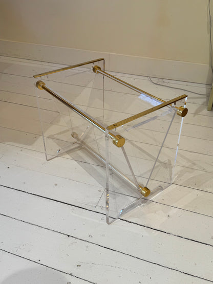 Mid-century plexiglas magazine with brass details