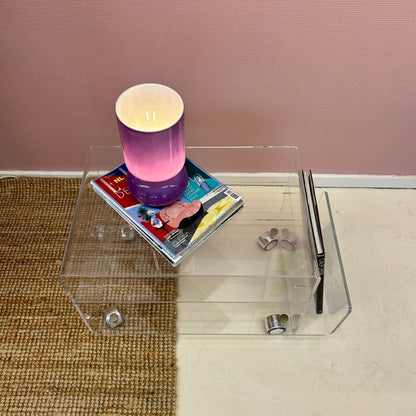 Lucite sidetable with magazineholder on wheels