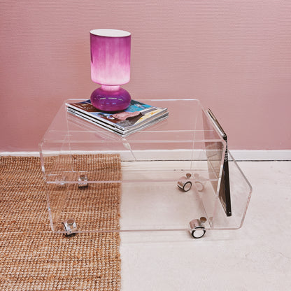 Lucite sidetable with magazineholder on wheels