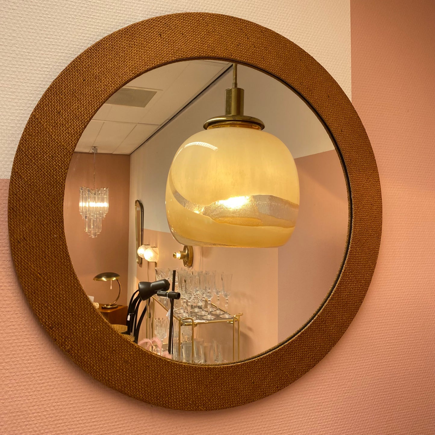 Round mirror from the 1960s with a jute frame