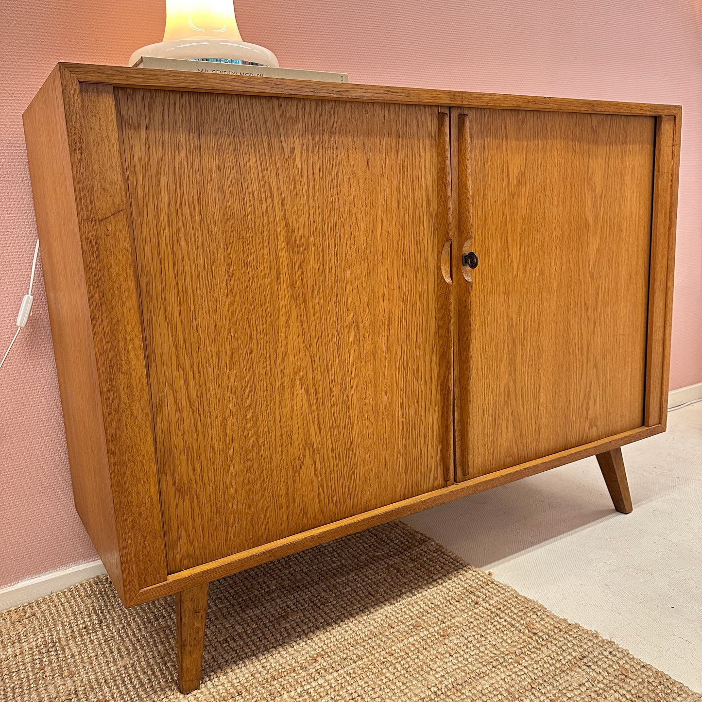 Mid-Century oak sideboard with sliding doors