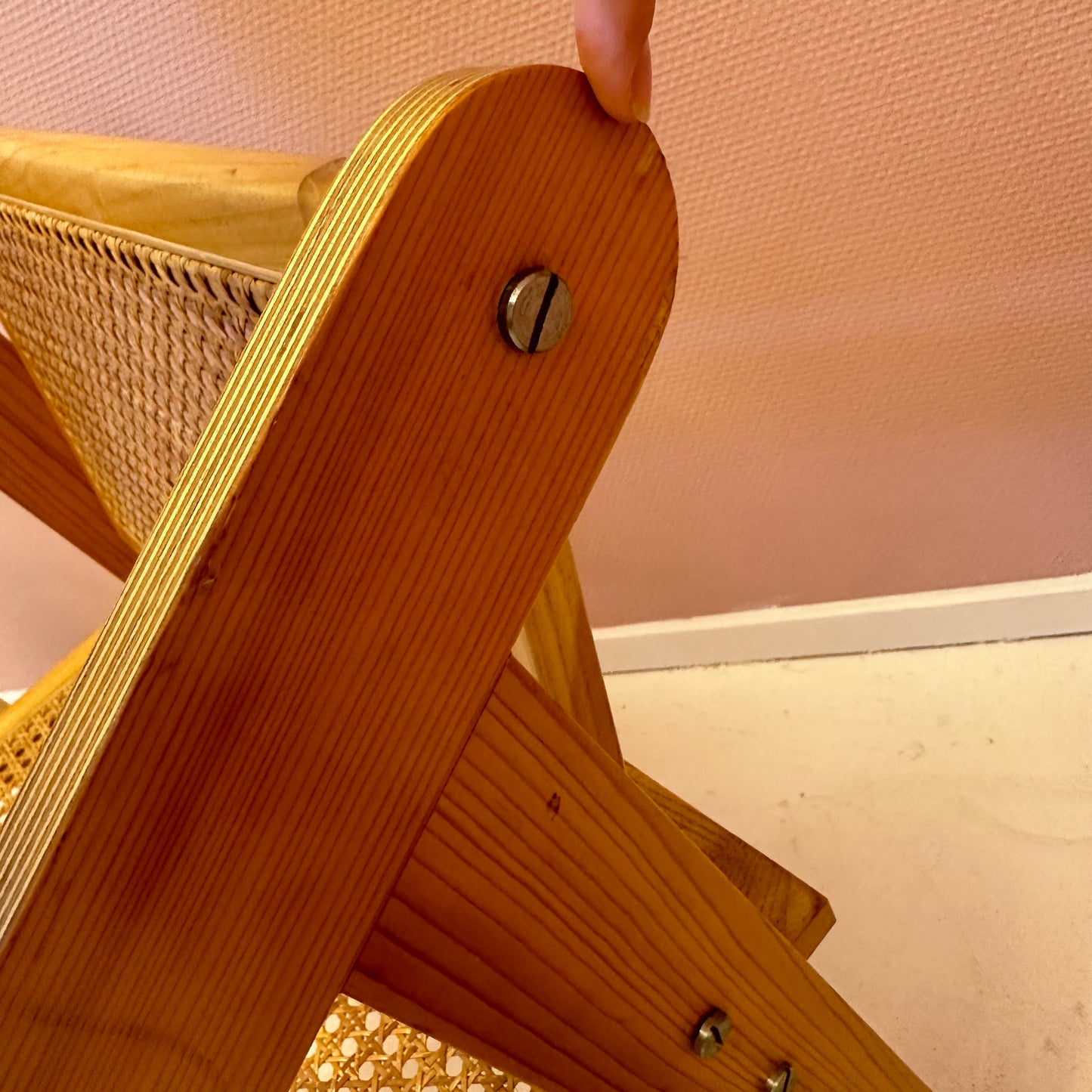 Wooden chair with webbing seat