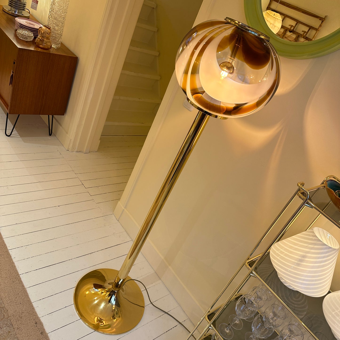 Italian Murano amber swirl glass globe floor lamp on brass base