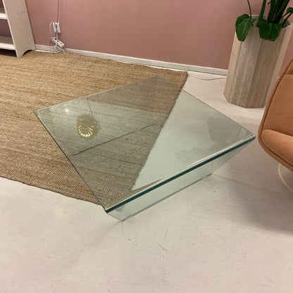 Square modern glass table with oblique legs