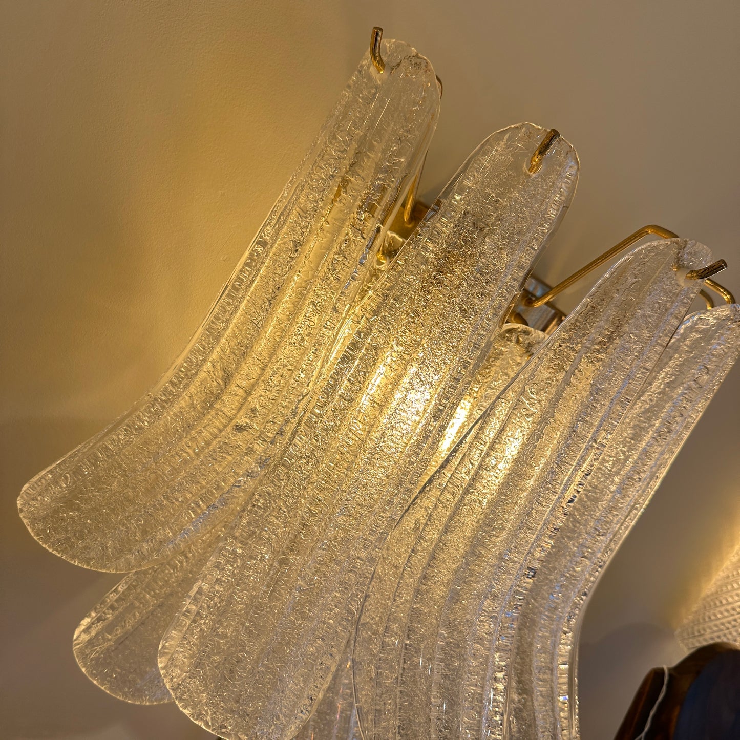 Glass wall light with Murano glass petals