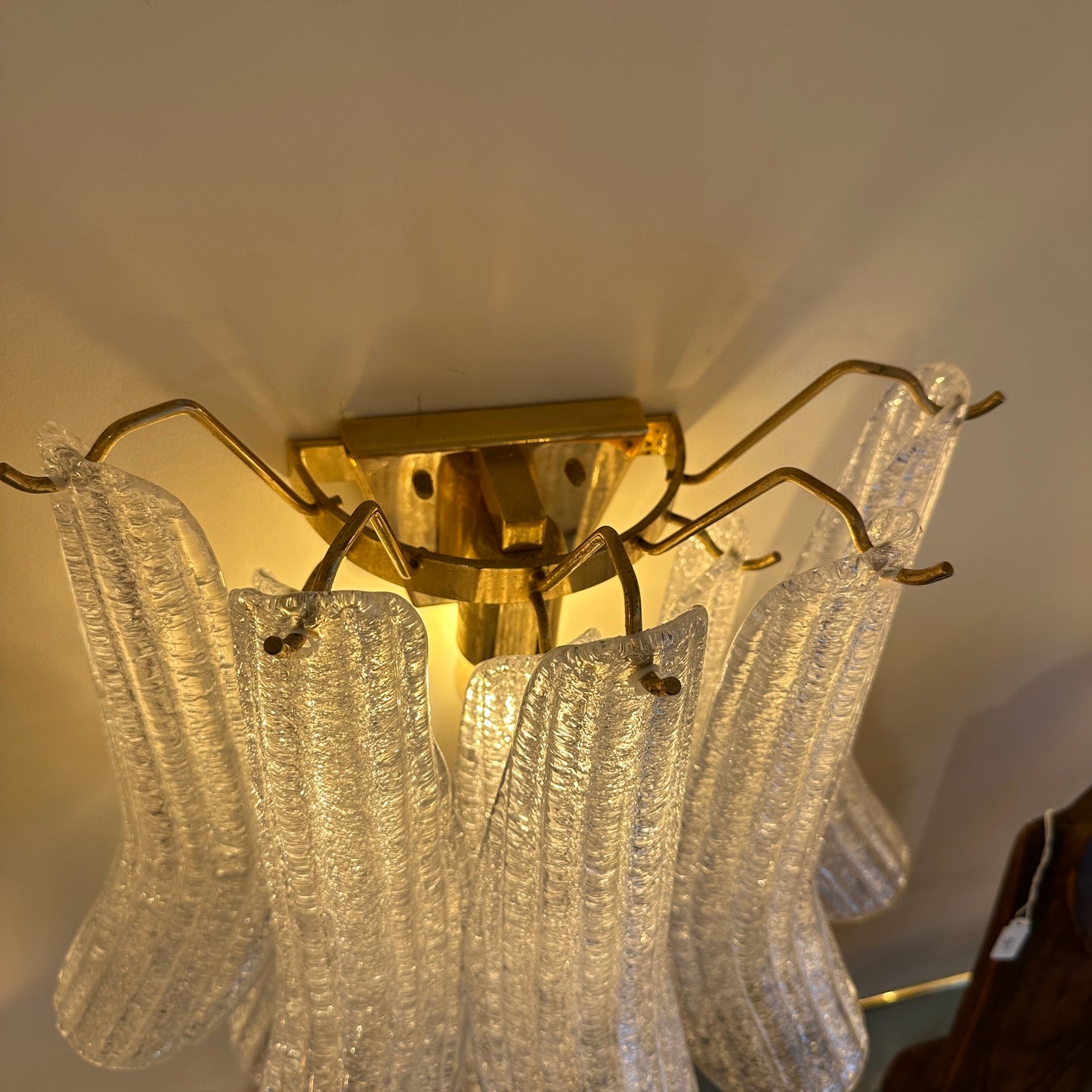 Glass wall light with Murano glass petals