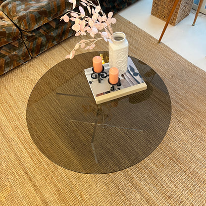 Round coffeetable with smoked glass and plexiglass base