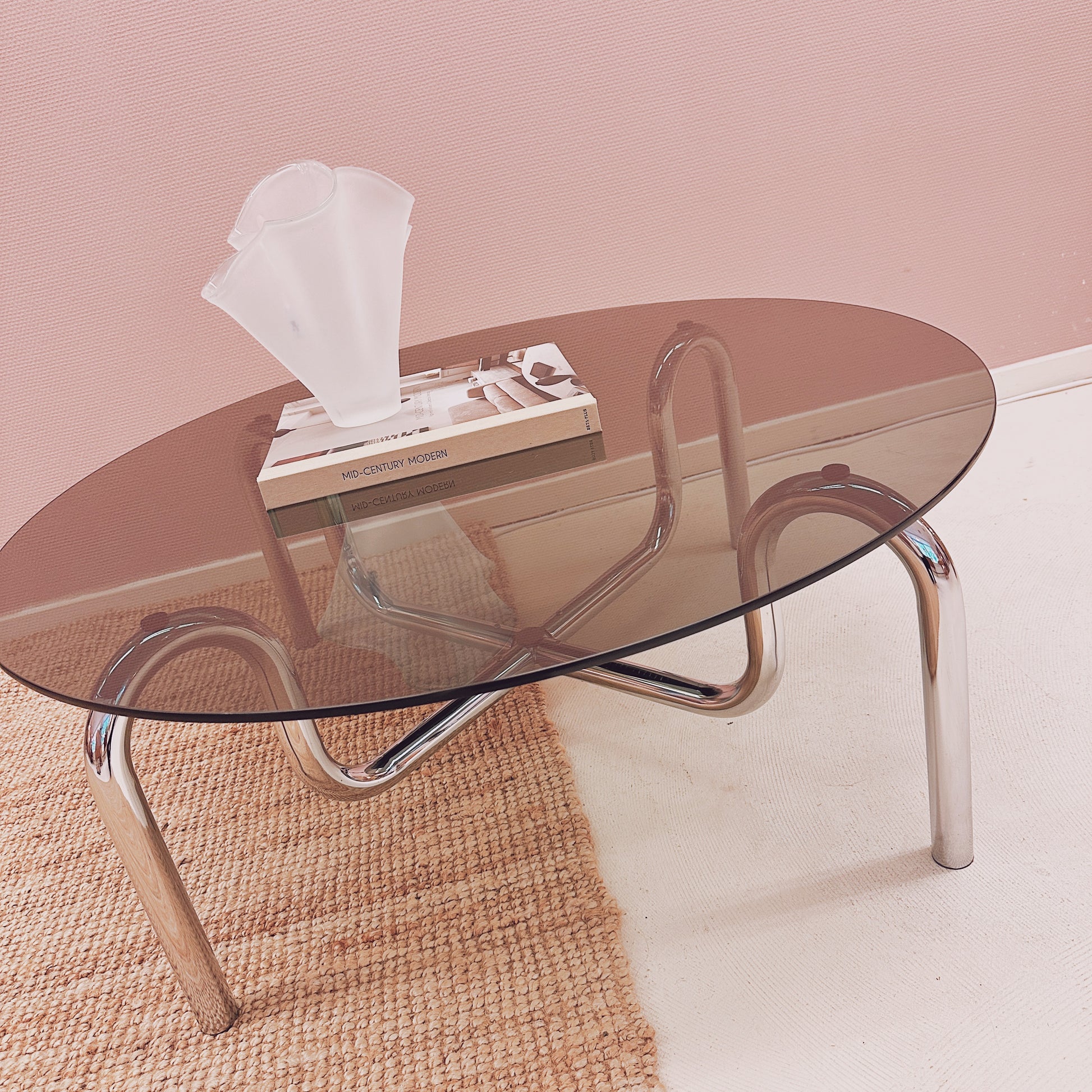 Vintage Curved tubular chrome coffee table with round glass top